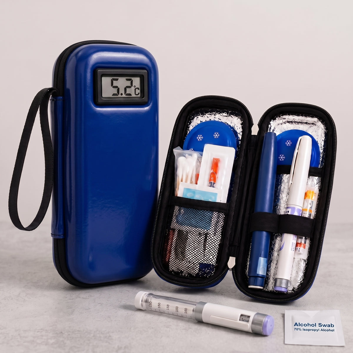 Estuche termico para insulina Isovio azul abierto con accesorios